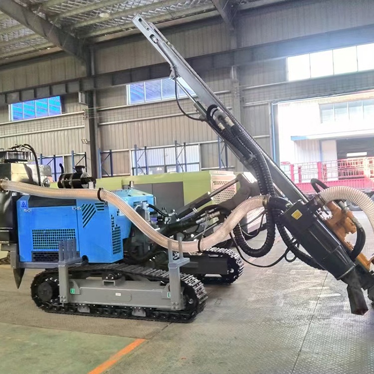 Crawler DTH drilling rig positioned for inclined foundation and anchor-hole drilling